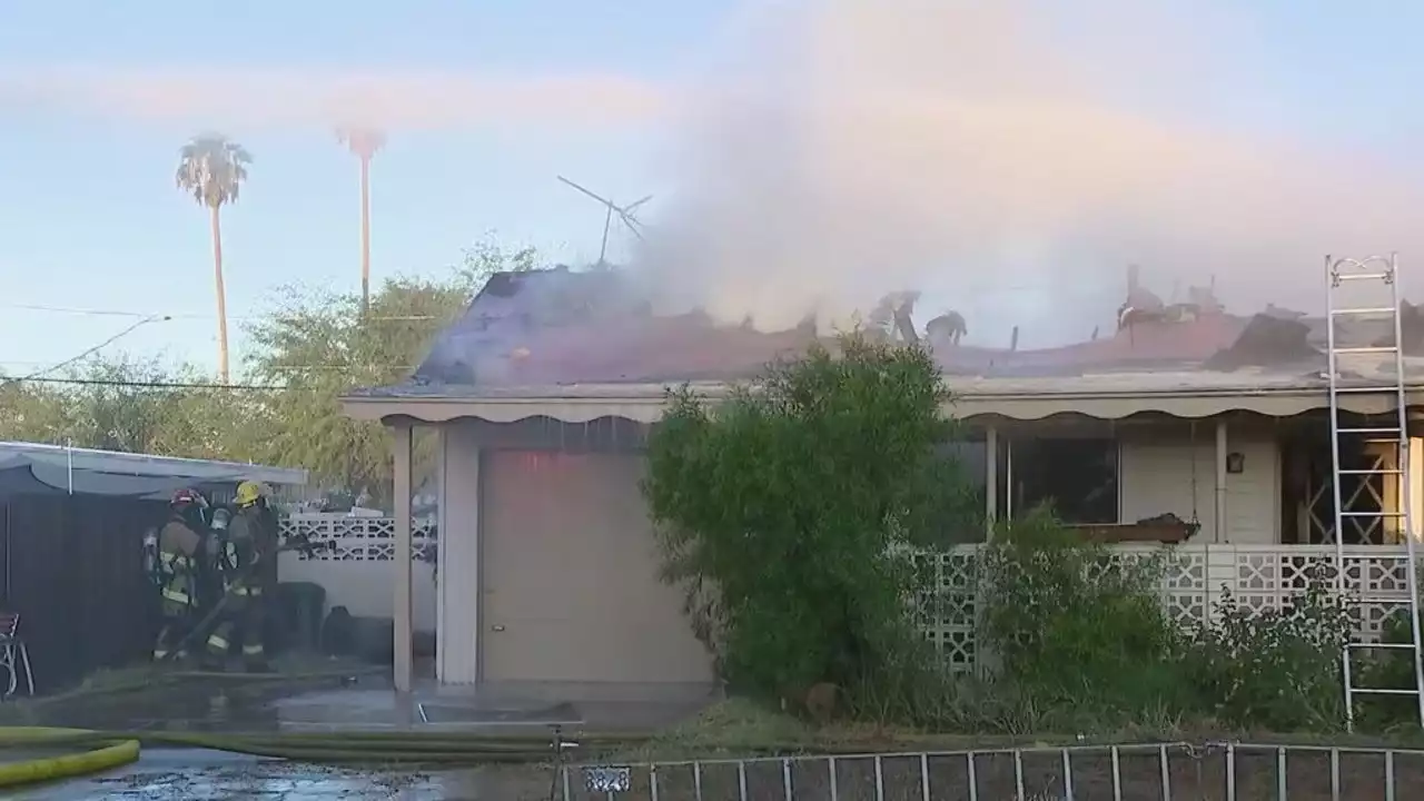 Firefighters battle 2 fires at same north Phoenix home