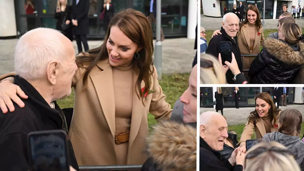 Man breaks unwritten rule by flinging arm around Kate during Royal visit