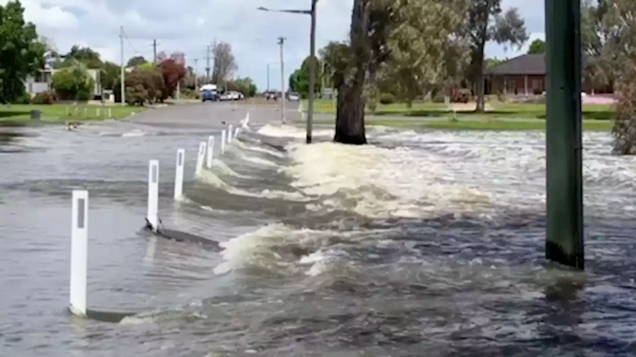 Thousands flee homes as 'blue-sky floods' hit Australia towns