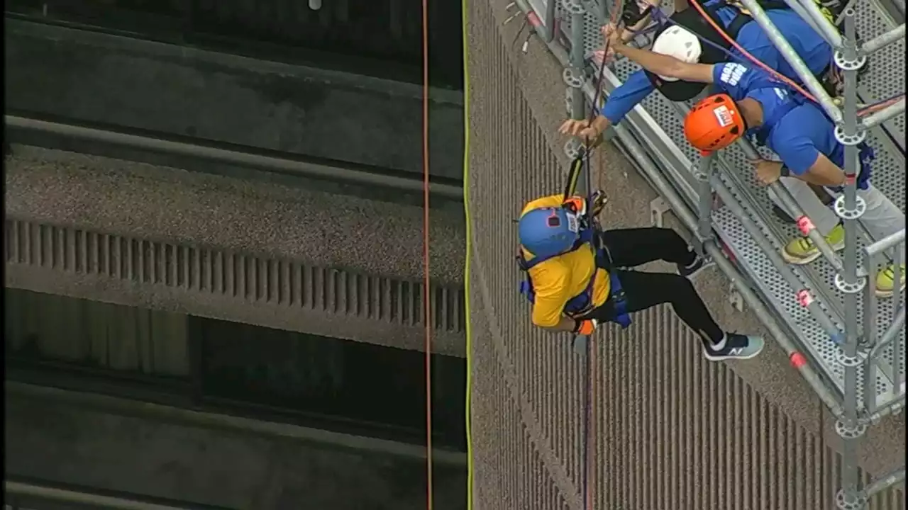 60 thrill-seekers rappel down 26-story Galleria hotel, raise upwards of $90,000 for fundraiser