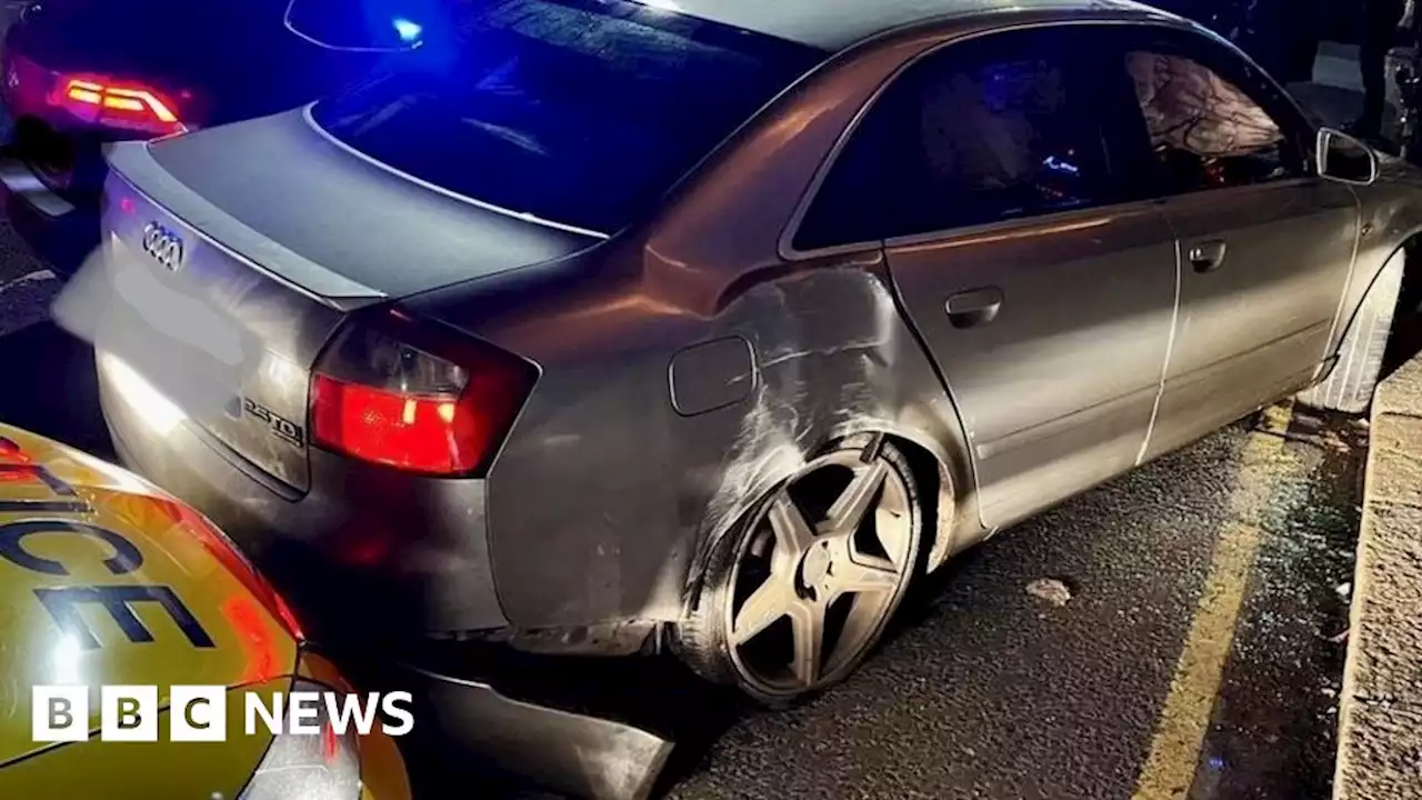 Man, 54, charged after police cars rammed in Belfast city centre