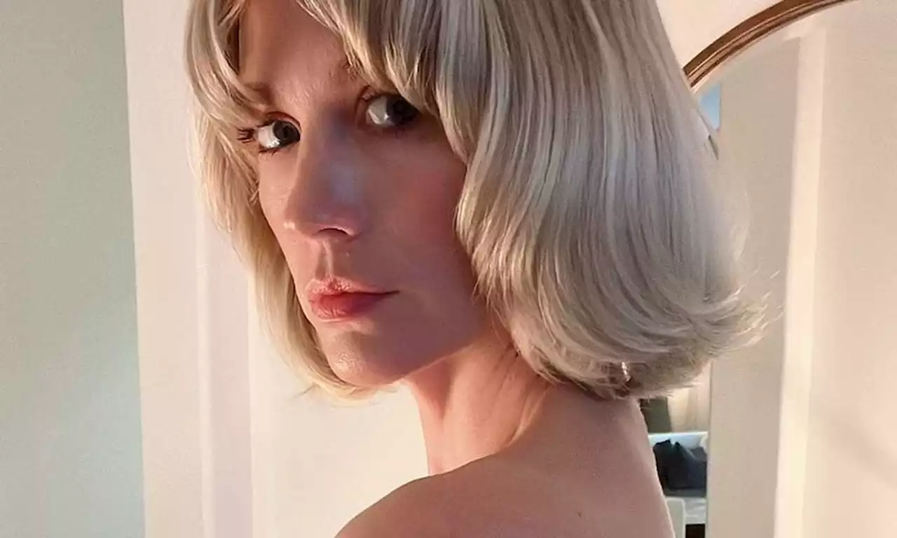 January Jones looks unreal in skintight bodysuit inside designer closet