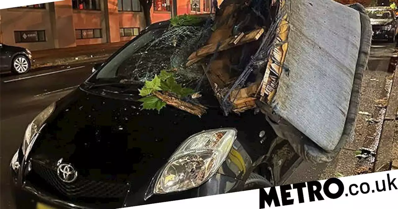 Man returns to his car to find a sofa had fallen from the sky and crushed it