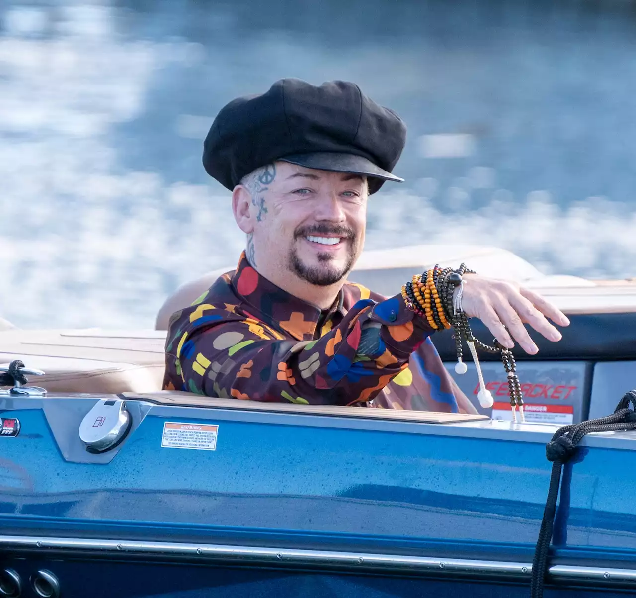 I'm A Celeb's Boy George all smiles as he sails onto show with co-stars