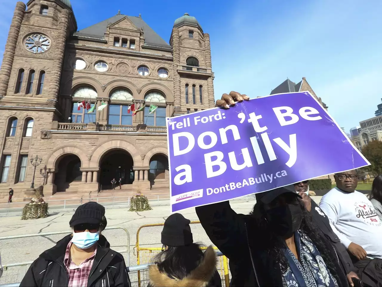 Some parents march with their children in support of CUPE workers