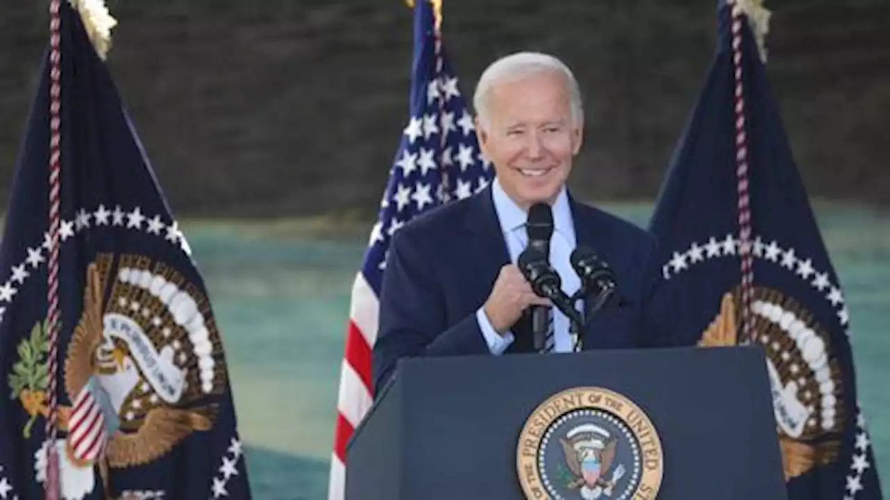 Biden 'optimistic' about midterms as Trump signals 2024 comeback