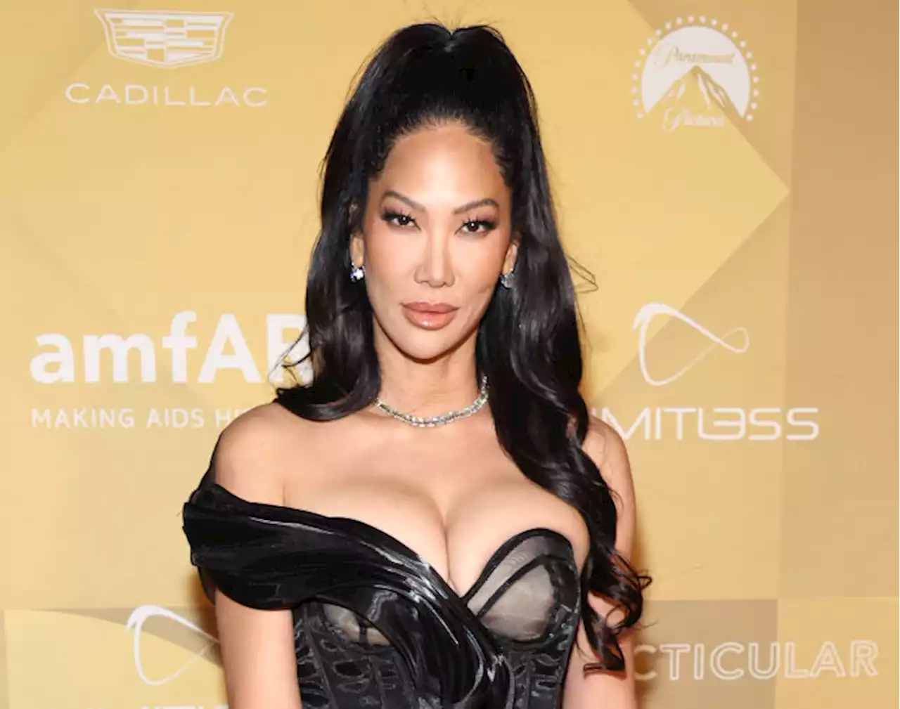 Kimora Lee Simmons Wears Asymmetric Gown With Sheer Details for amfAR Gala Los Angeles