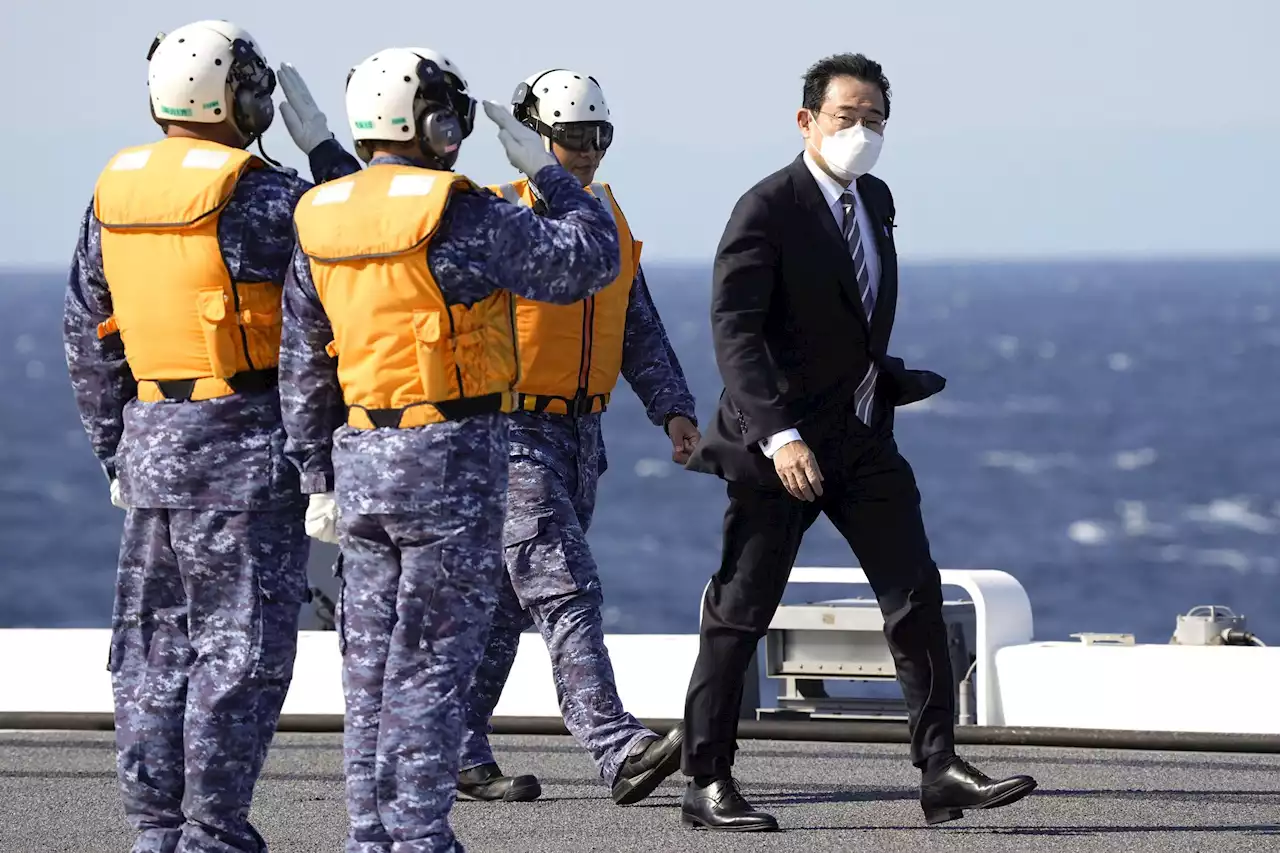 Japan PM vows to strengthen military at int'l naval review