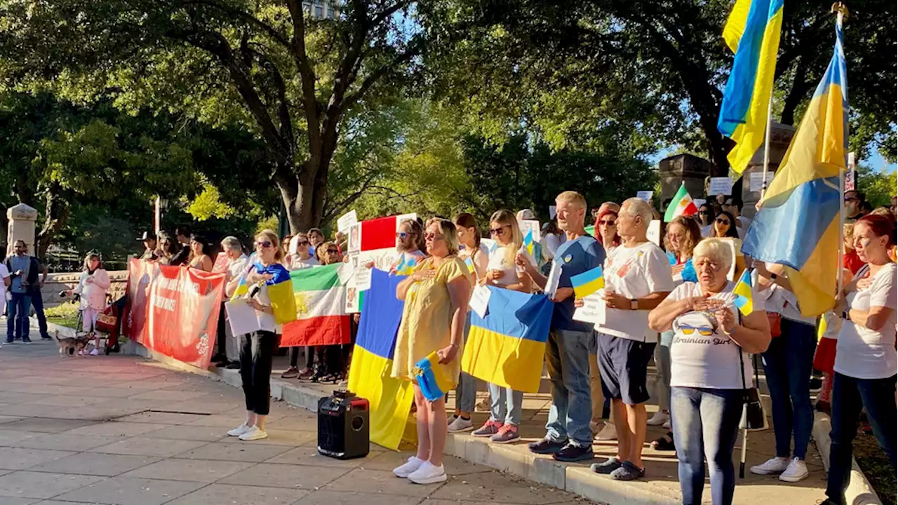 Ukrainian and Iranian communities stand in solidarity at rally