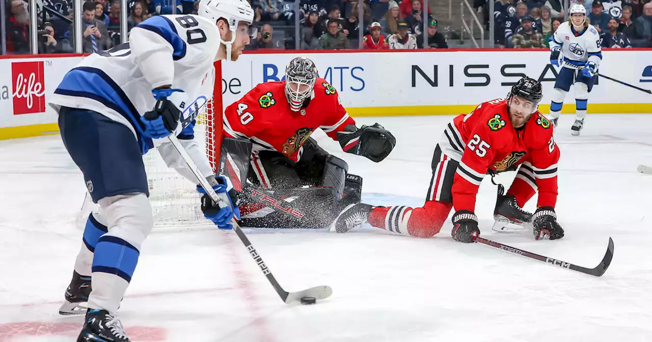 Hellebuyck gets 2nd shutout as Jets beat Blackhawks 4-0