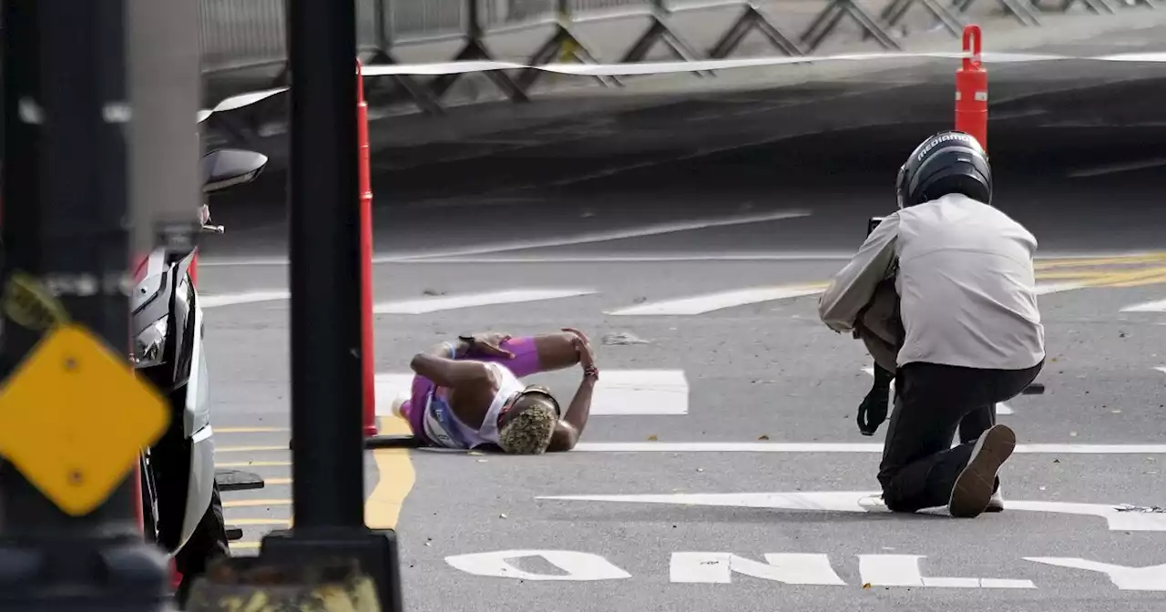 Lead runner collapses during unusually warm New York City Marathon