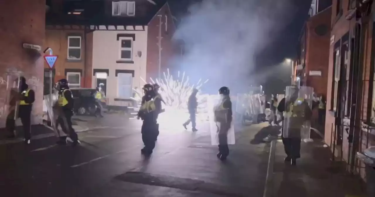 Leeds street looks like battle field as yobs pelt police with fireworks