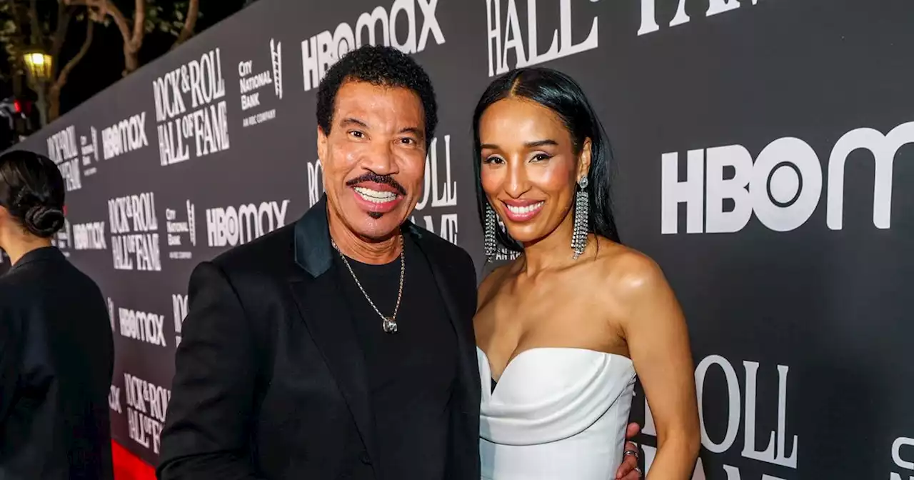 Lionel Richie, 73, cuddles up to glamorous girlfriend, 33, on night out