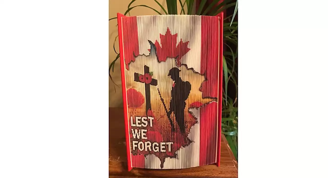 Book-edge art creates beautiful Remembrance Day display