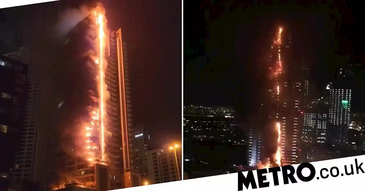 Inferno tears through 35-storey skyscraper near the world's tallest building