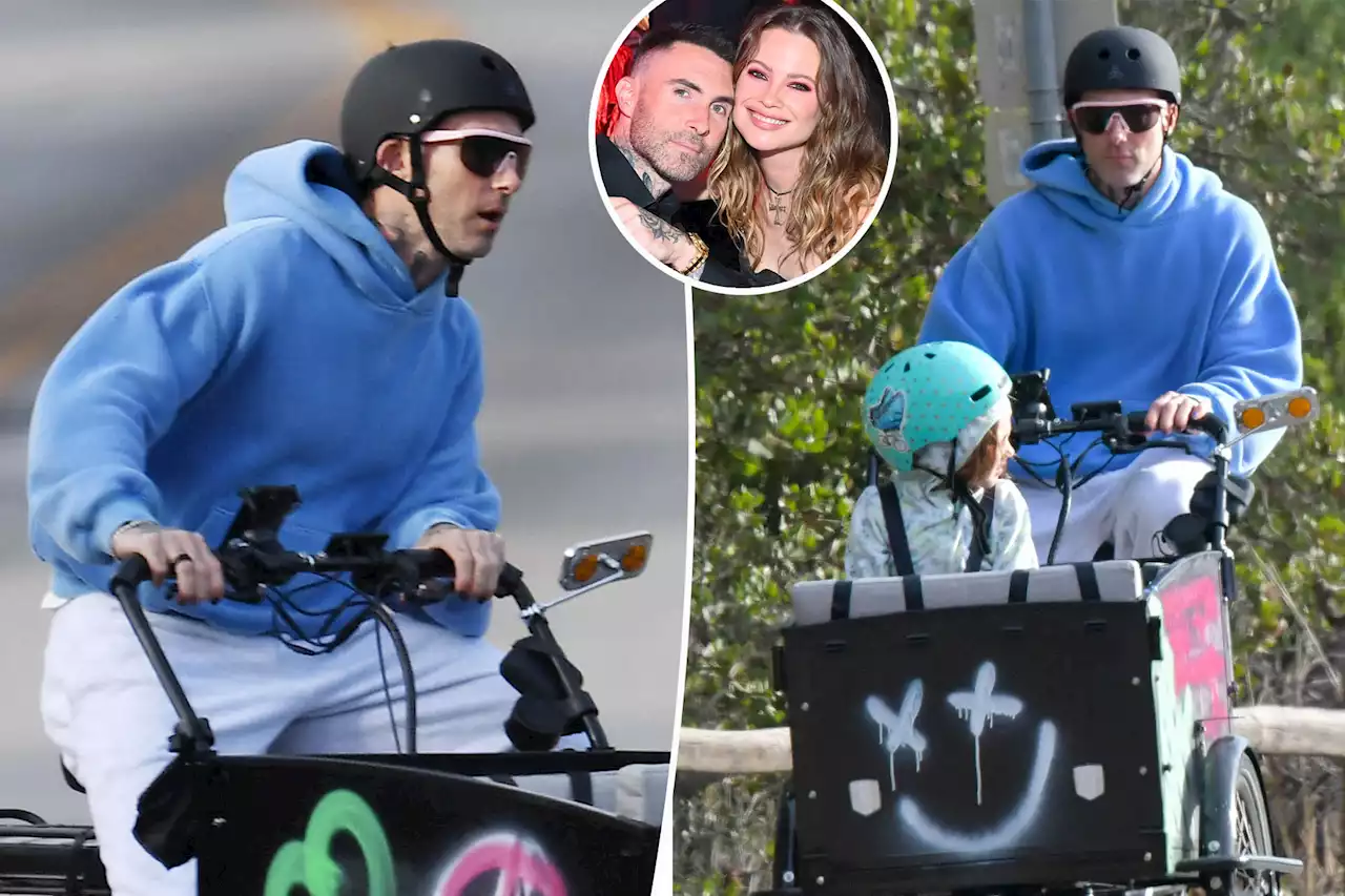 Adam Levine takes daughter for a bike ride after scandal