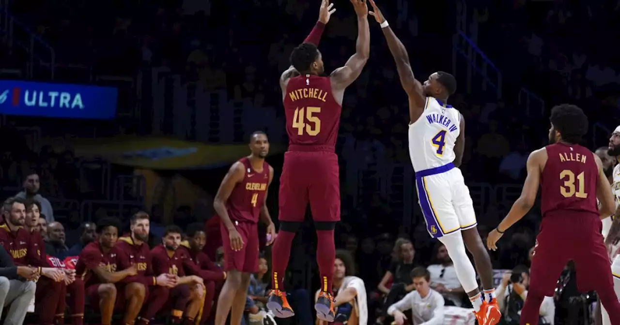 Garland, Mitchell lead Cavs past Lakers to 8th straight win