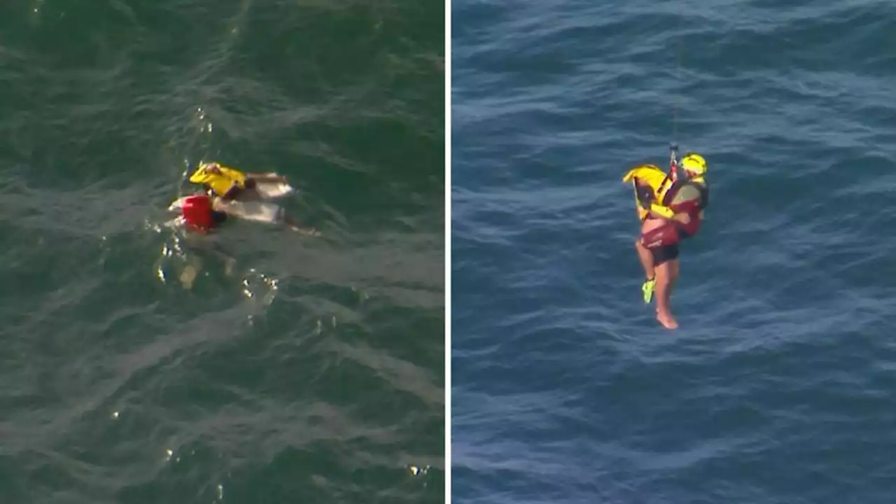 Watch as men found floating in Queensland waters rescued after desperate mayday call