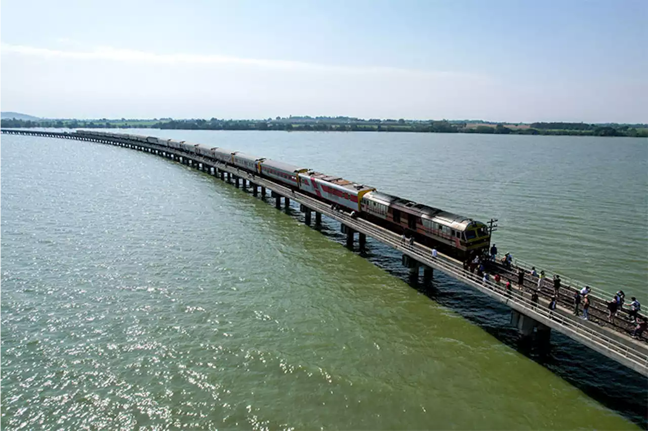 Thailand's 'floating train' a big hit as dam waters rise