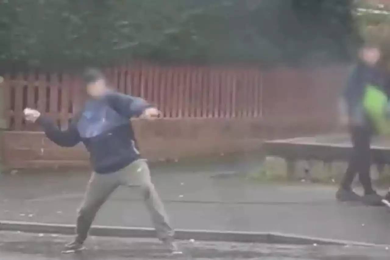 Video shows moment yobs throw bottles and cans at bus in Ashton, leaving passengers 'shaking'