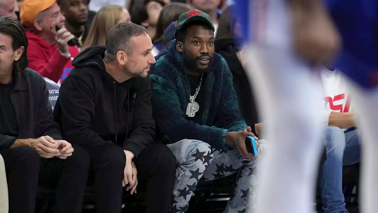 Watch Meek Mill Accidentally Trip Ref During Sixers Game