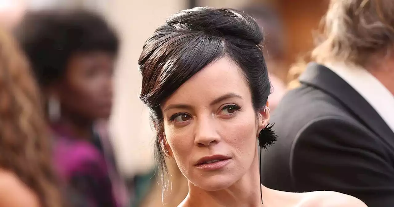 Lily Allen looks very chic with a glossy 'French bob' and micro fringe