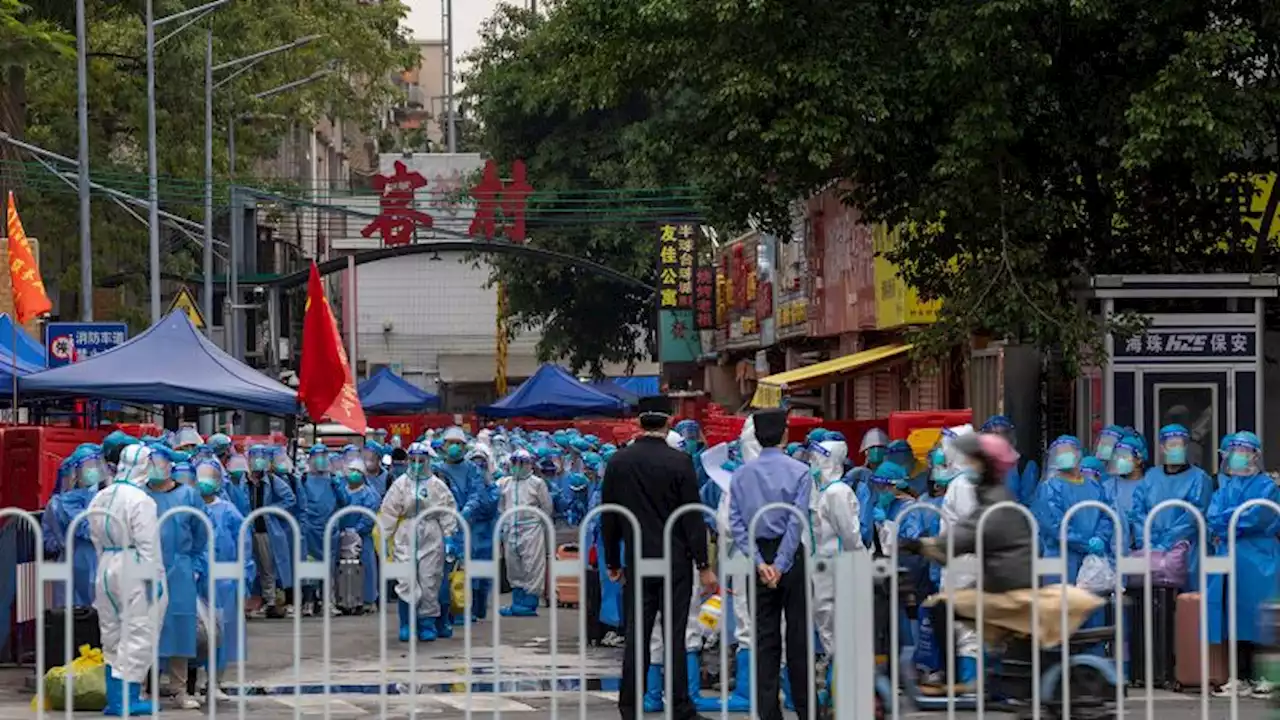 China's manufacturing hub Guangzhou partially locked down as Covid outbreak widens | CNN