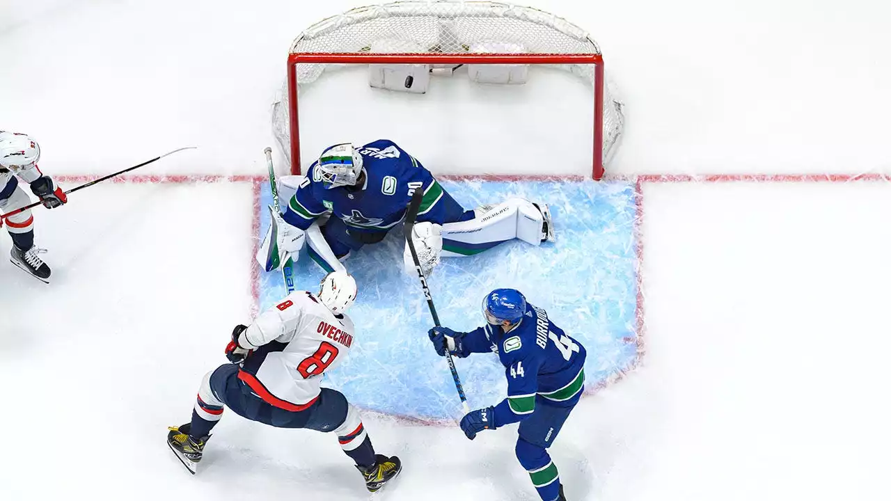 Capitals' Alex Ovechkin breaks Wayne Gretzky record with 403rd career goal on the road in win over Canucks