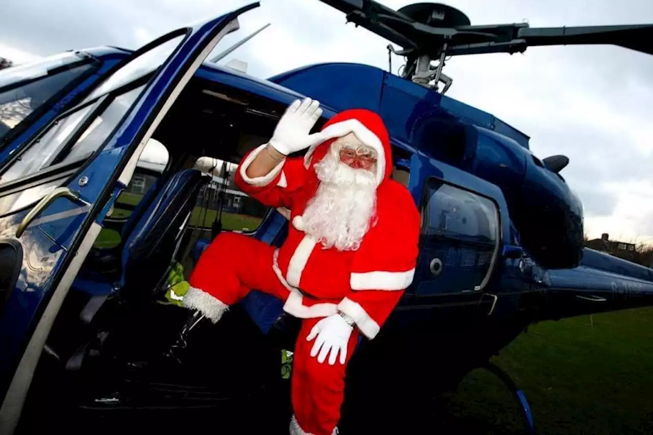 Santa rocks up in helicopter leaving kids delighted