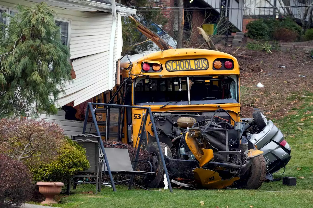 School bus crashes into house in New York suburb