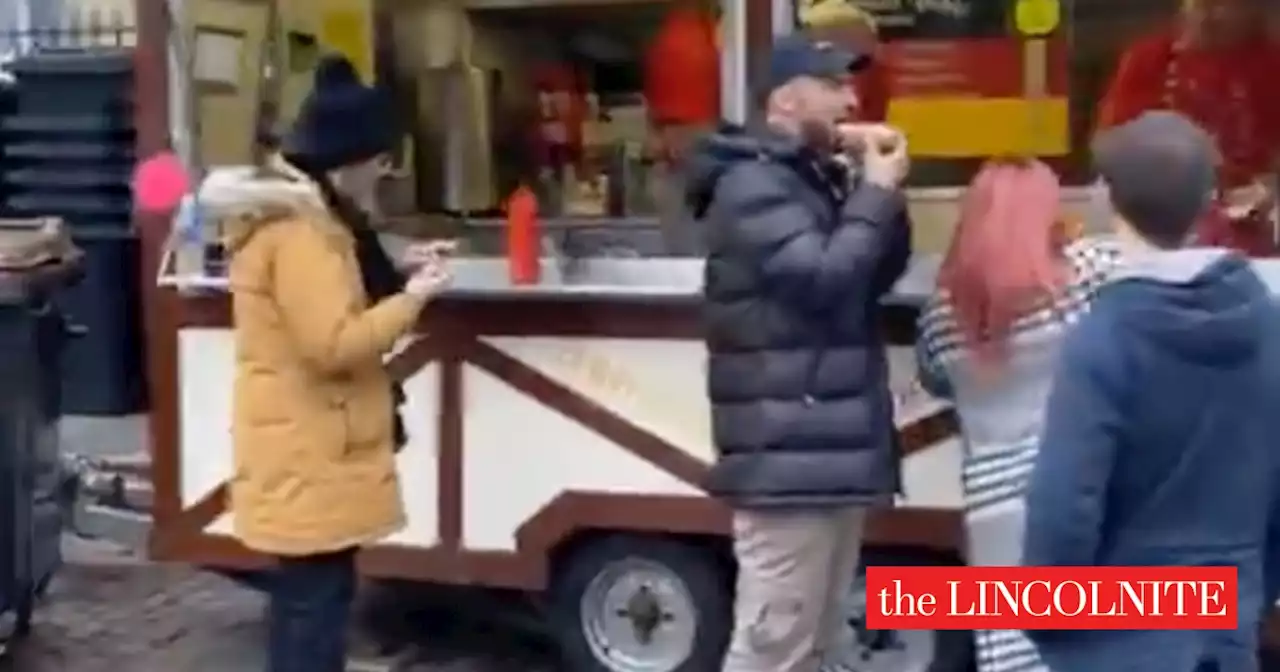 Jake Quickenden and Kerry Katona enjoy hotdogs at Lincoln Christmas Market