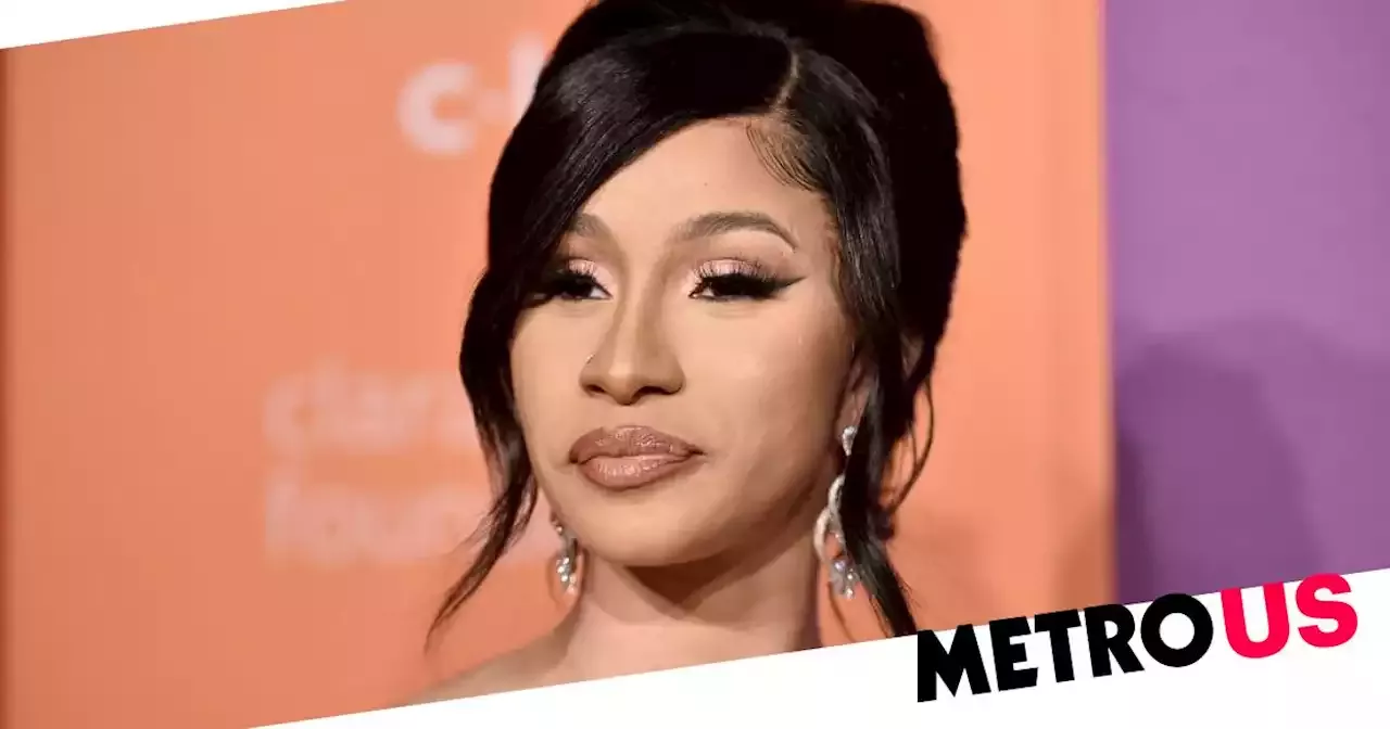 Cardi B confirms most of her bum filler has been removed as she gives advice