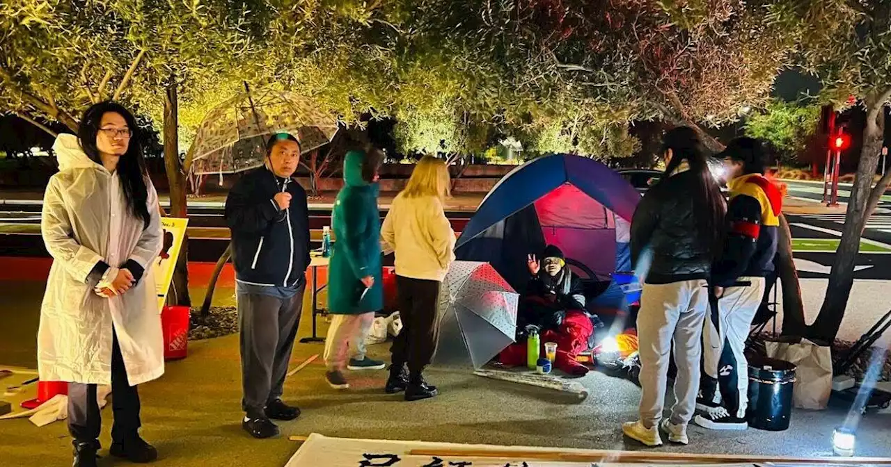 Chinese pro-democracy activists protest at Apple Park