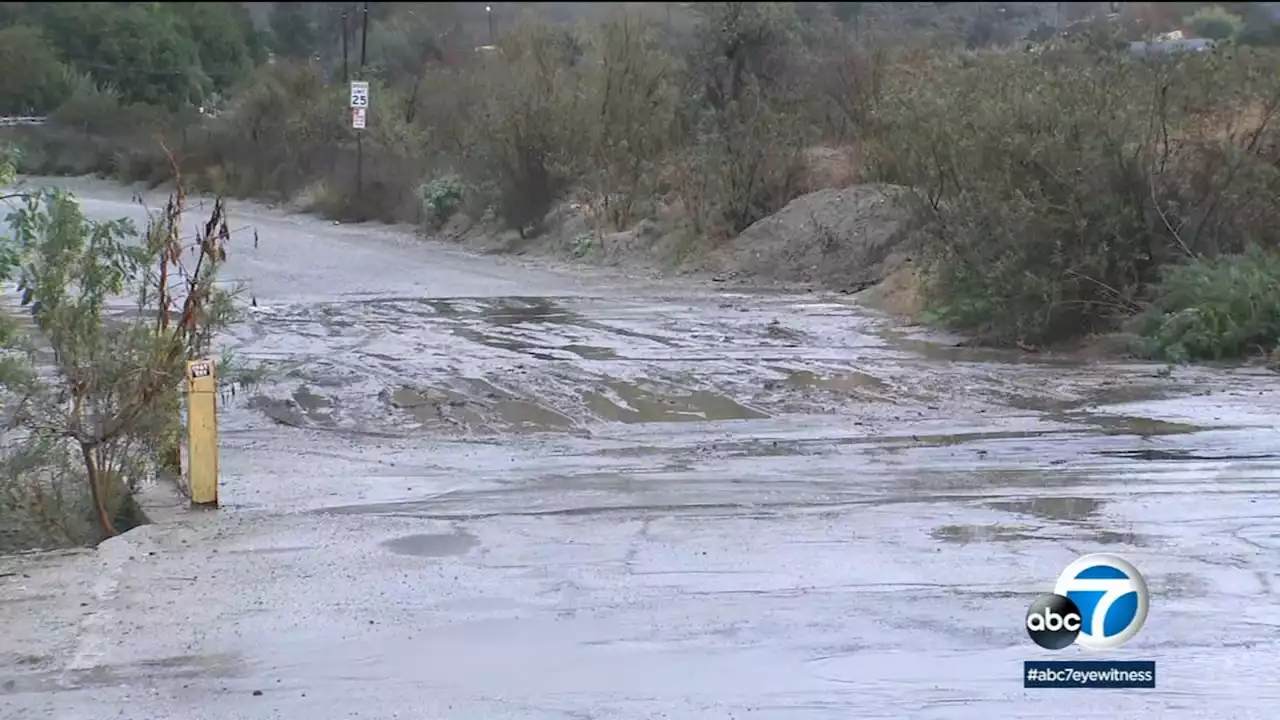 Storm system moves into Southern California, prompting street closures in flooded areas