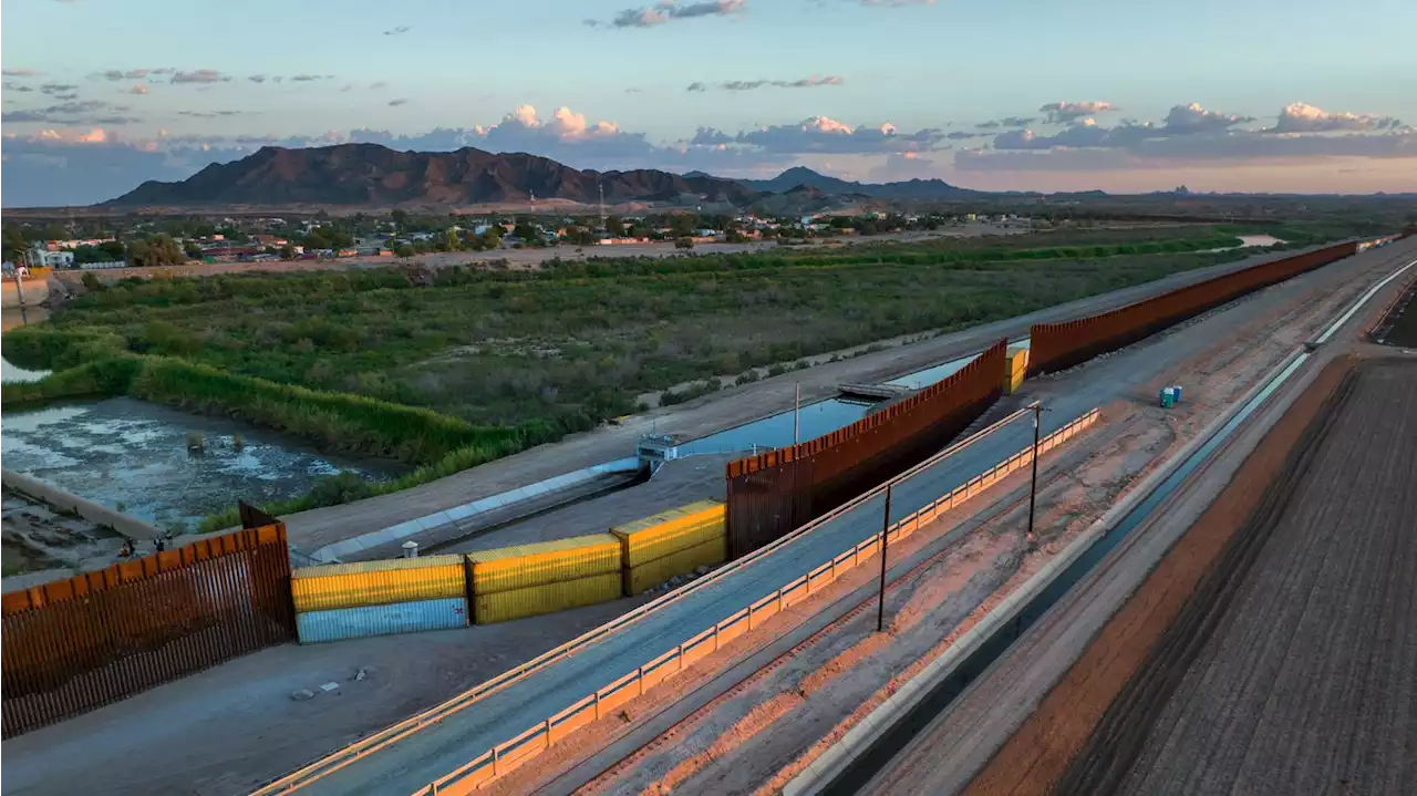 Gov. Ducey builds border wall with shipping containers before leadership transition