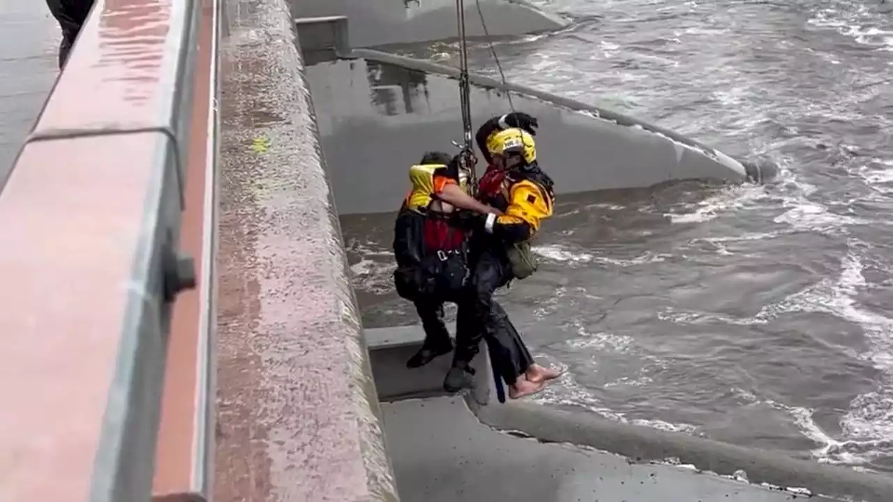 VIDEO: Firefighters rescue man swept away in Santa Ana River