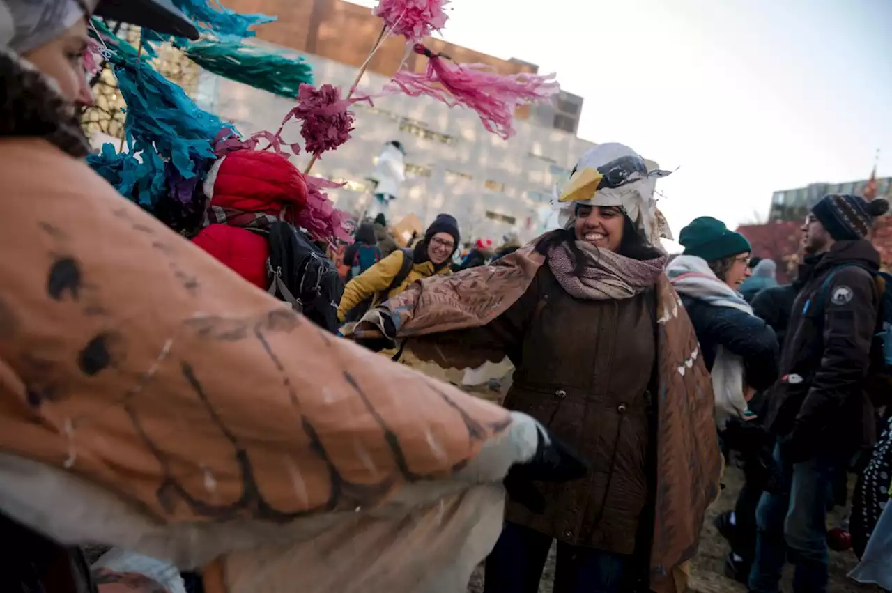 Activists dressed as birds and trees rally for nature at COP15 in Montreal