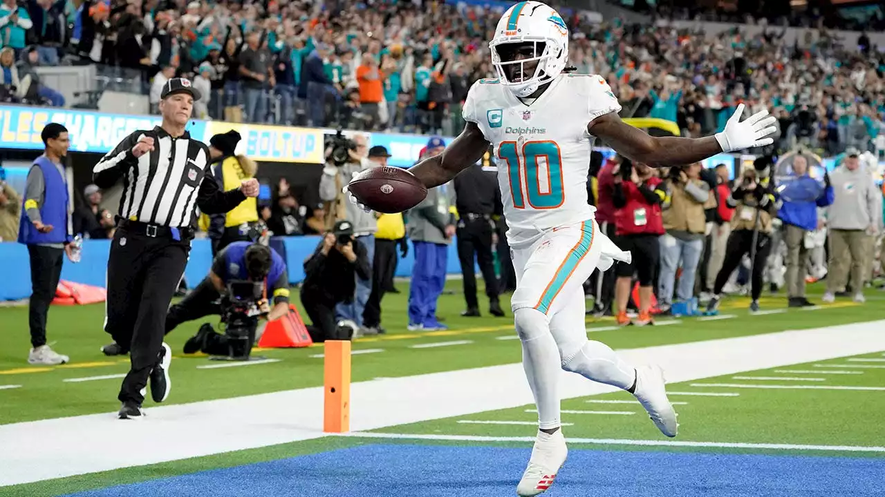 Dolphins' Tyreek Hill scores touchdown on chaotic fumble recovery vs. Chargers