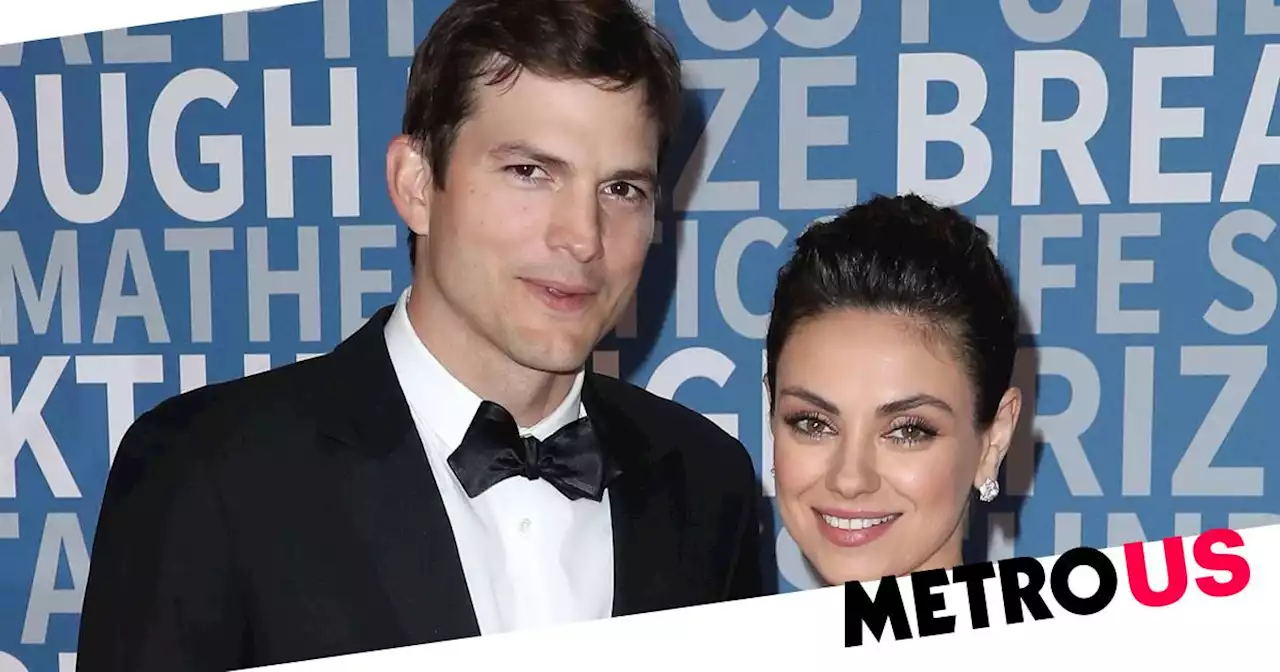 Mila Kunis was 'curled up' next to husband Ashton Kutcher through health battle