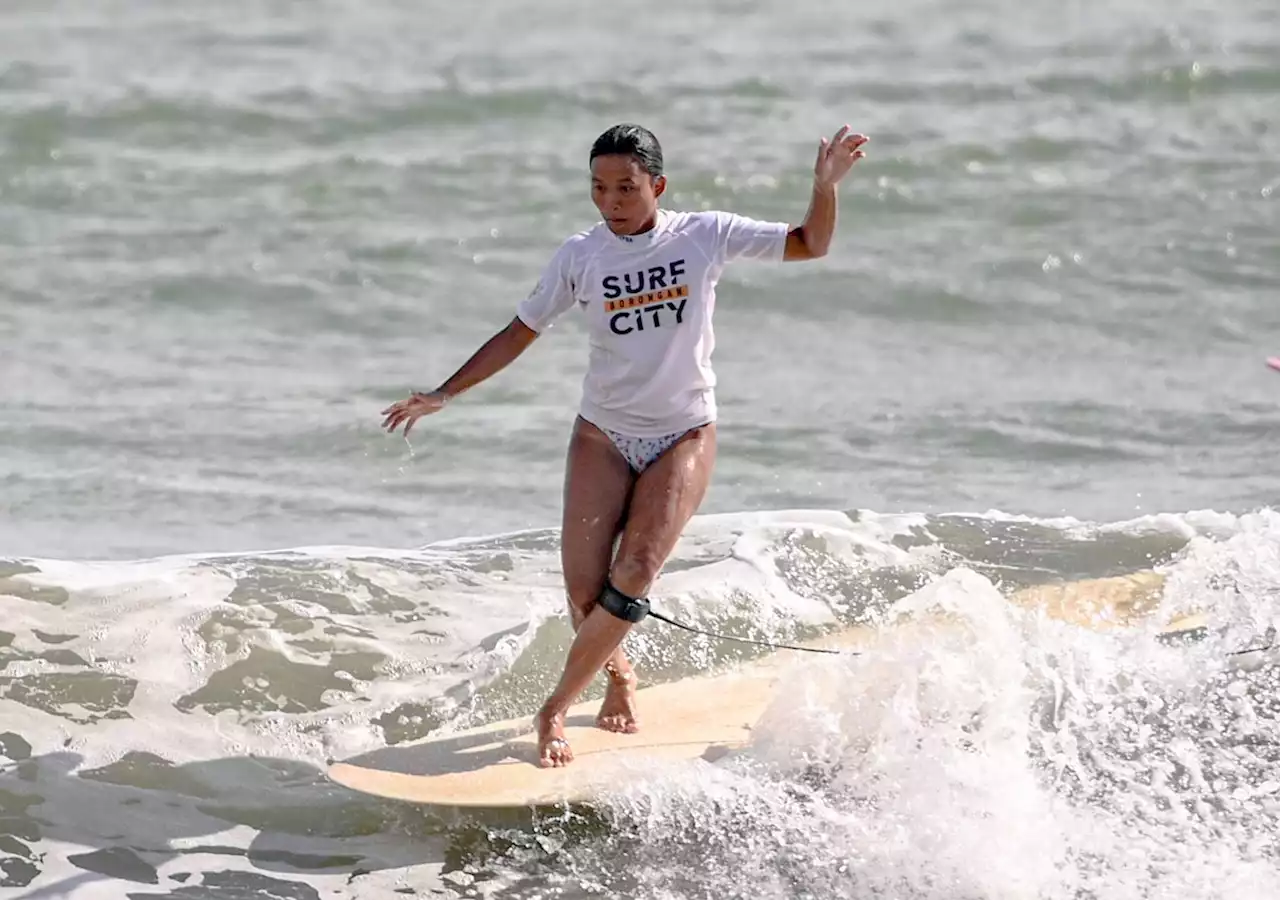 Aping Agudo emerges women's longboard champ in Ilocos Sur surfing tilt