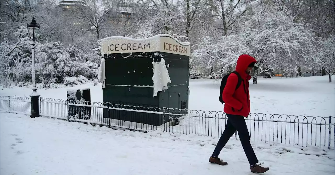 Heavy snow disrupts UK travel; three boys die after falling into lake