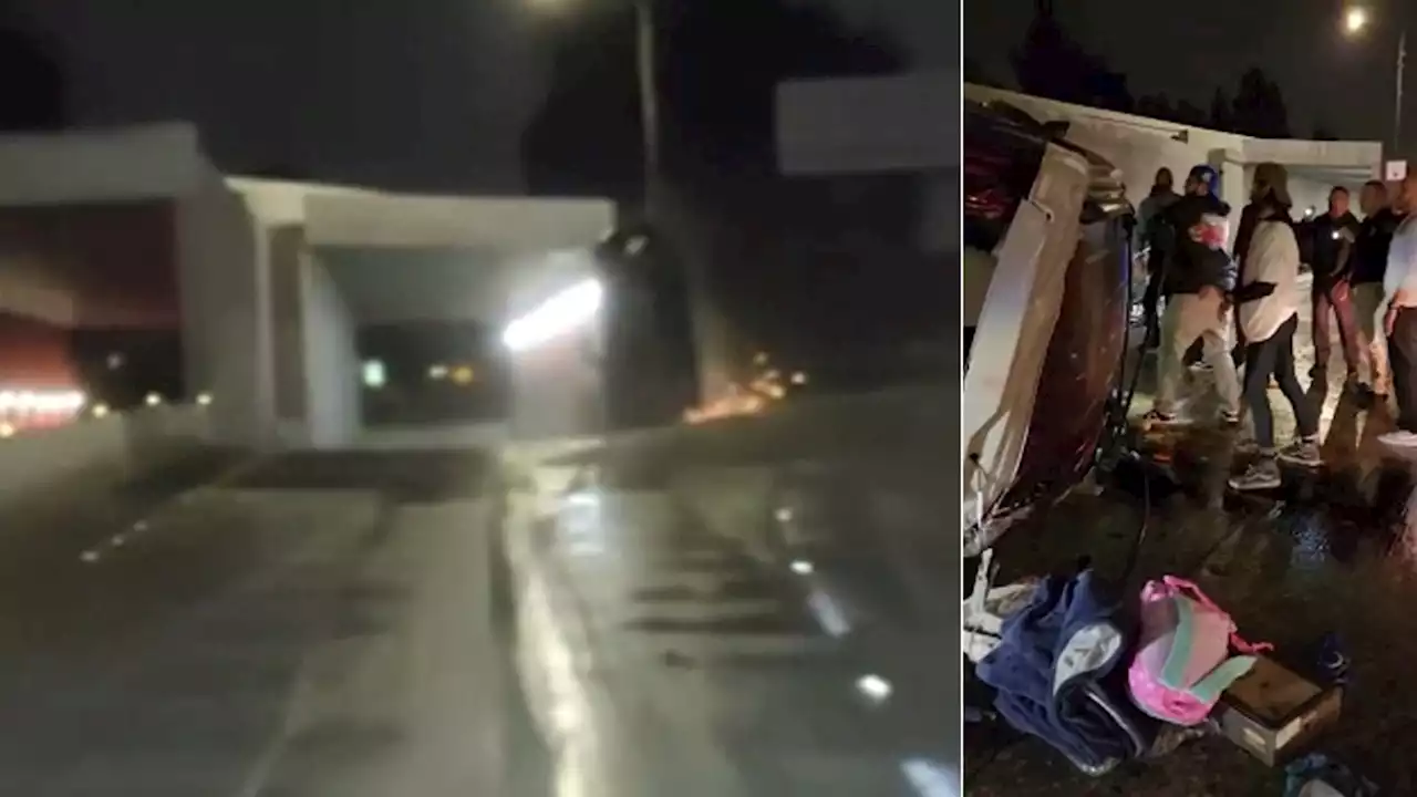 Dramatic video shows bystanders rescue trapped driver after car flips over on 10 Fwy in Rosemead