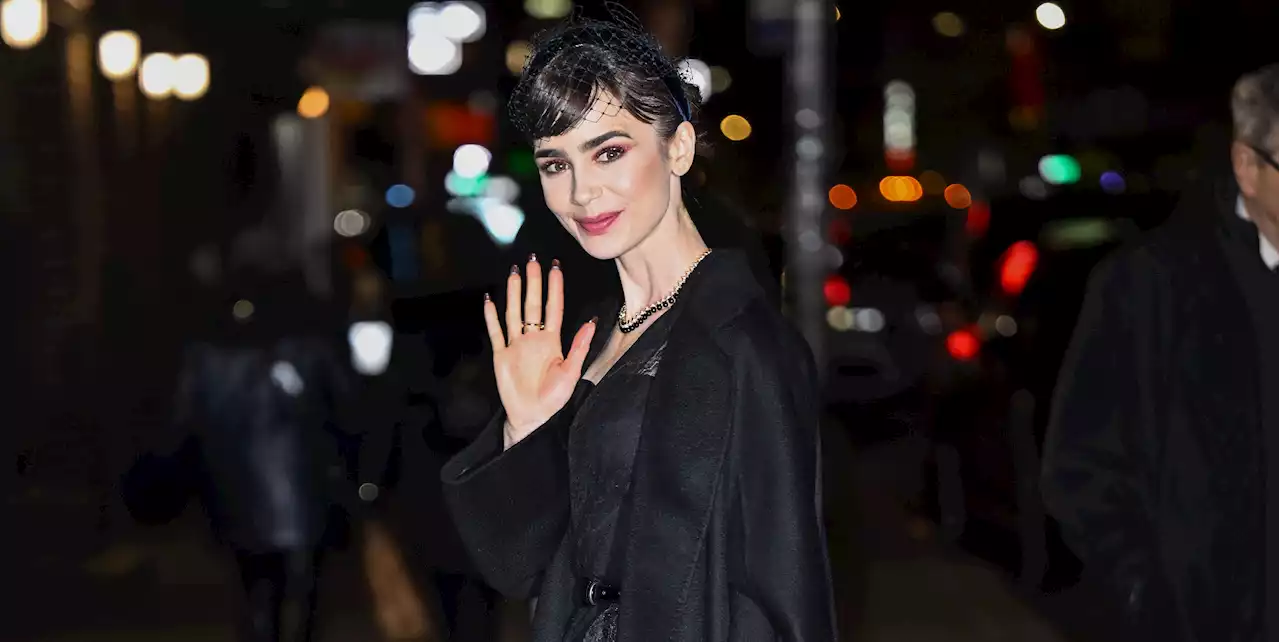 Lily Collins Channels Audrey Hepburn in a Black Cocktail Dress and Fishnet Veil