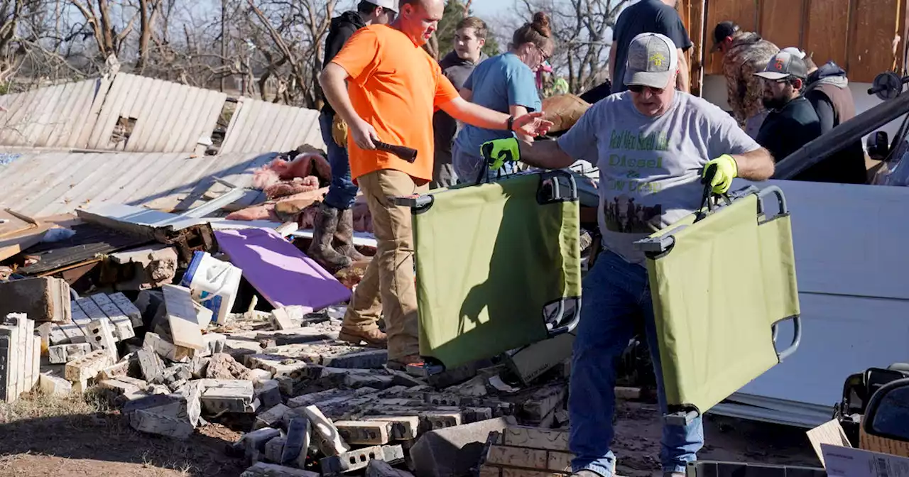 Tornadoes in South kill at least two as blizzard-like conditions hit Great Plains