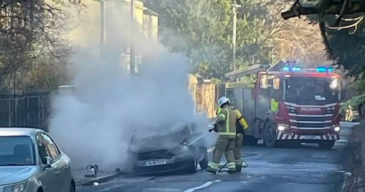 Emergency services rush to Scots street after car bursts into flames