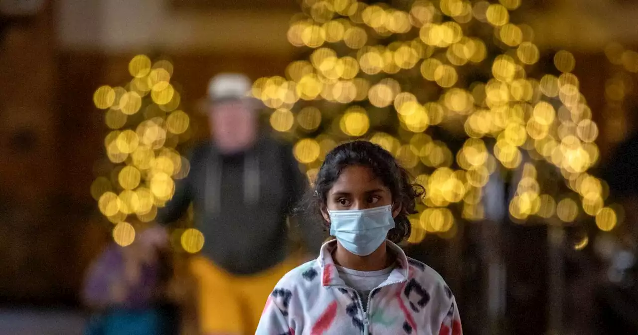 Health officials are urging masks again amid high COVID, flu levels