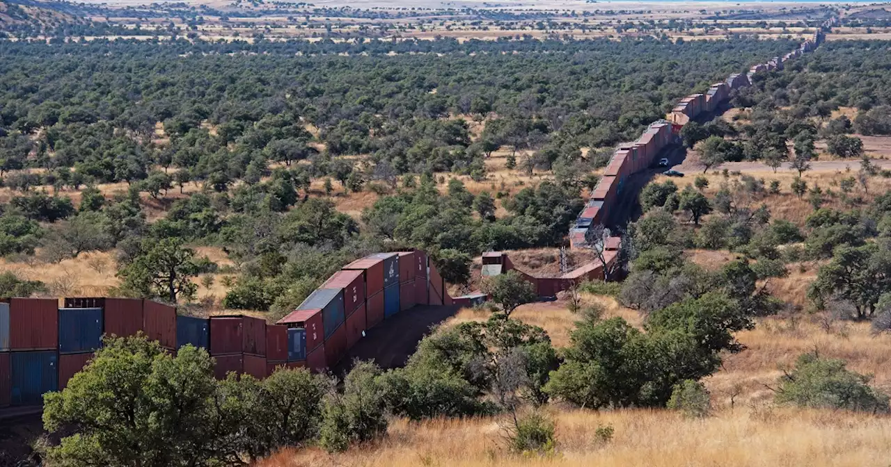 Protesters block construction of Arizona border wall made of shipping containers