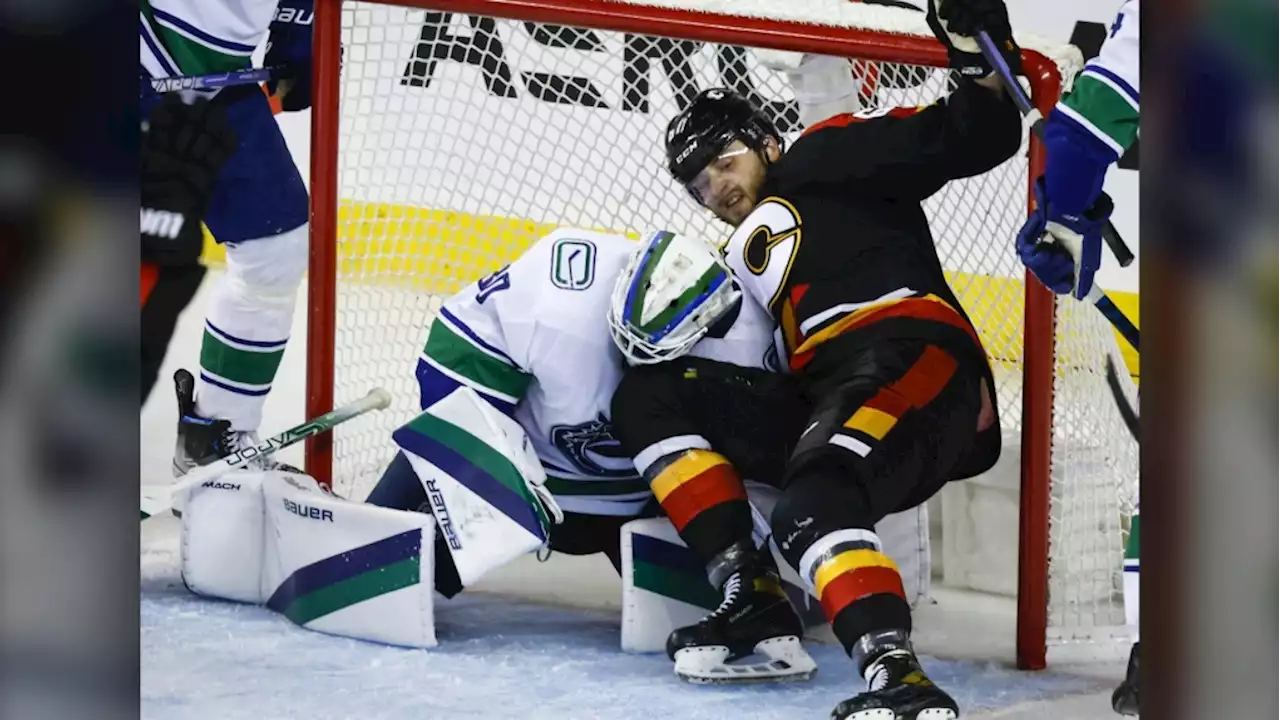 Kuzmenko, Martin lead Canucks to 4-3 shootout win over Flames