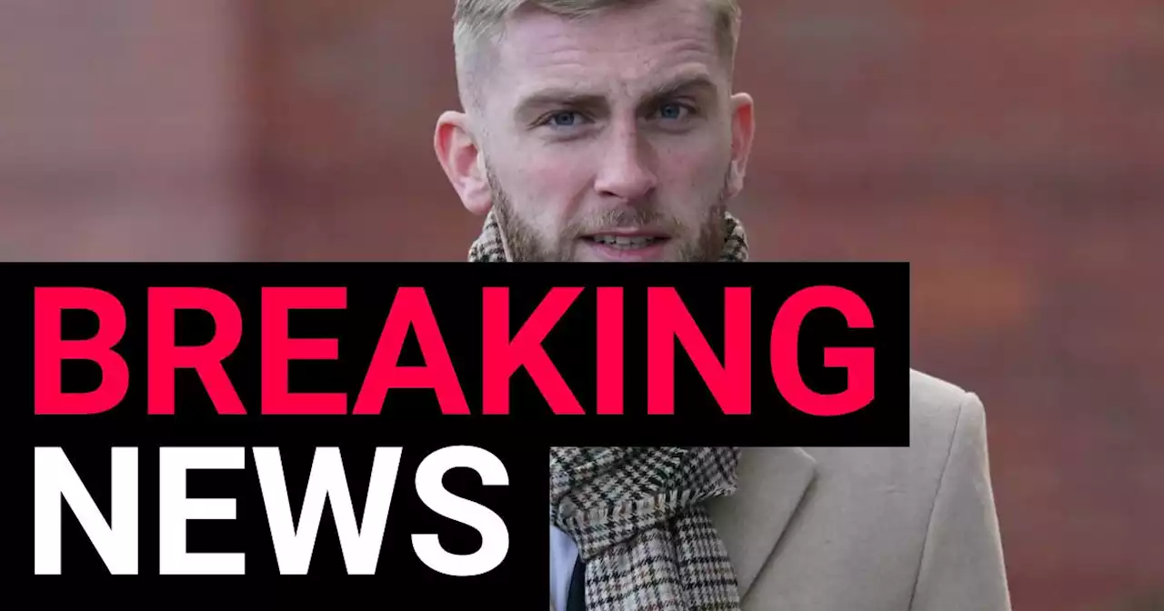 Scotland footballer Oli McBurnie cleared of assaulting fan during pitch invasion