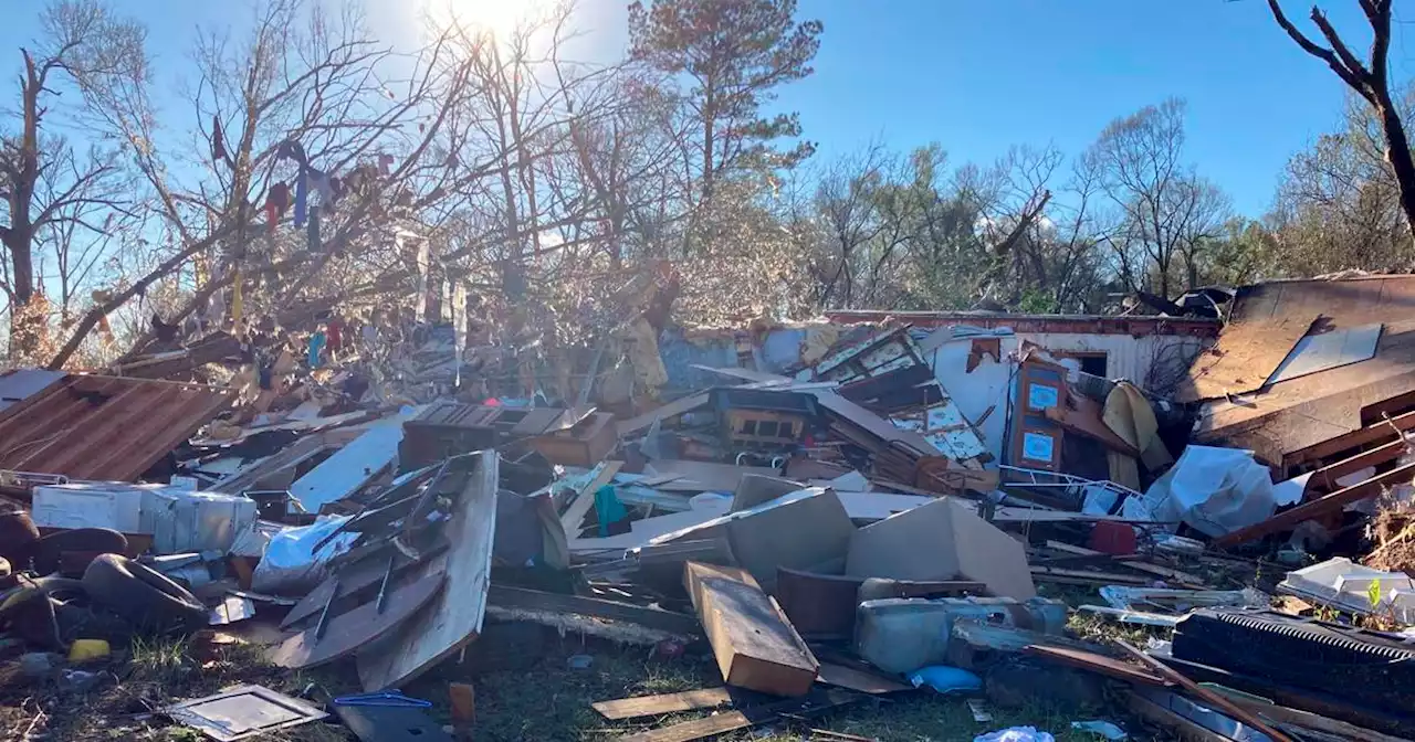 The South cleans up after tornadoes as blizzards advance north